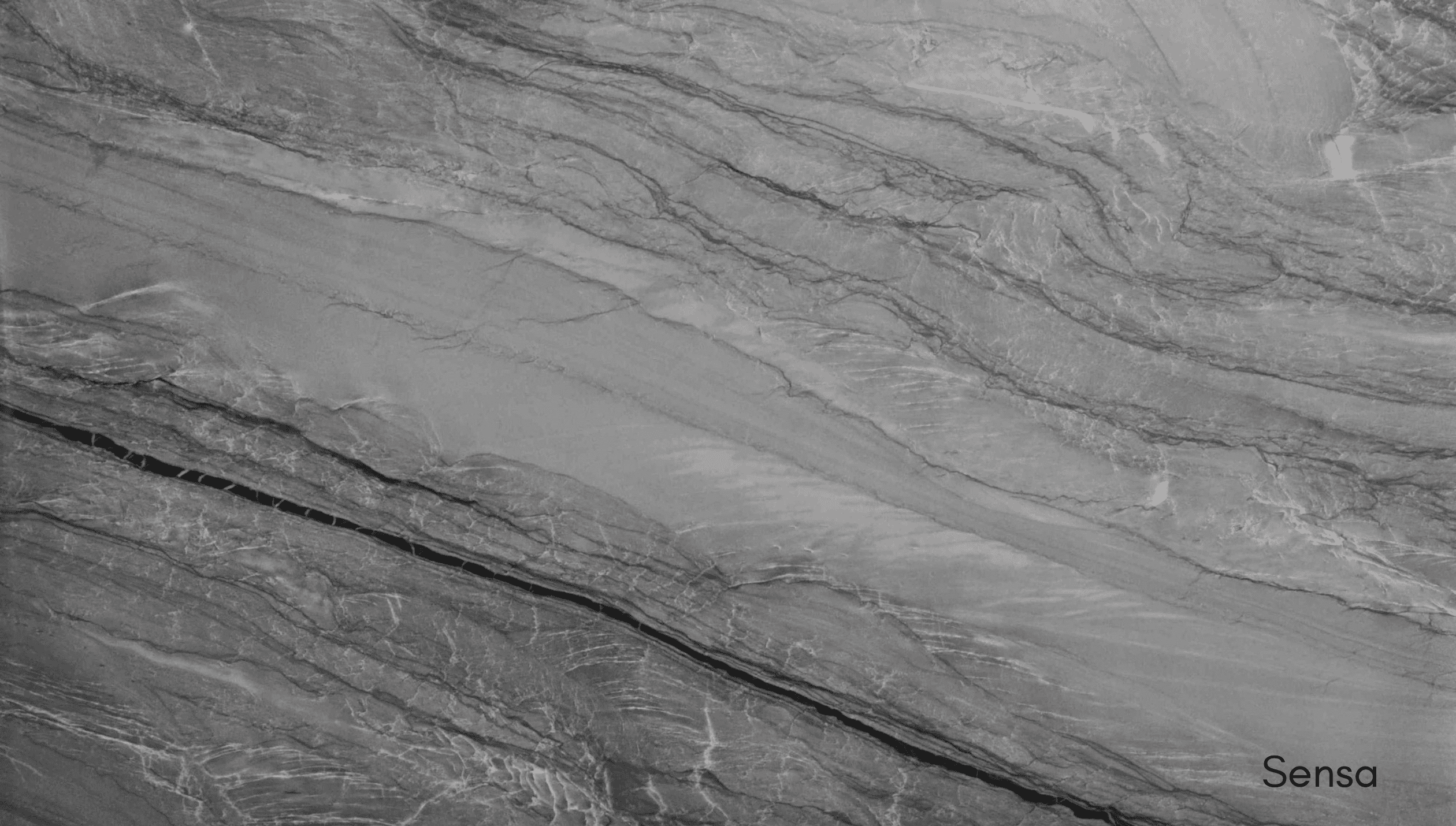Modern kitchen millwork showcasing sedimentary Sensa natural stone. Premium custom cabinetry crafted for homes in Coquitlam.