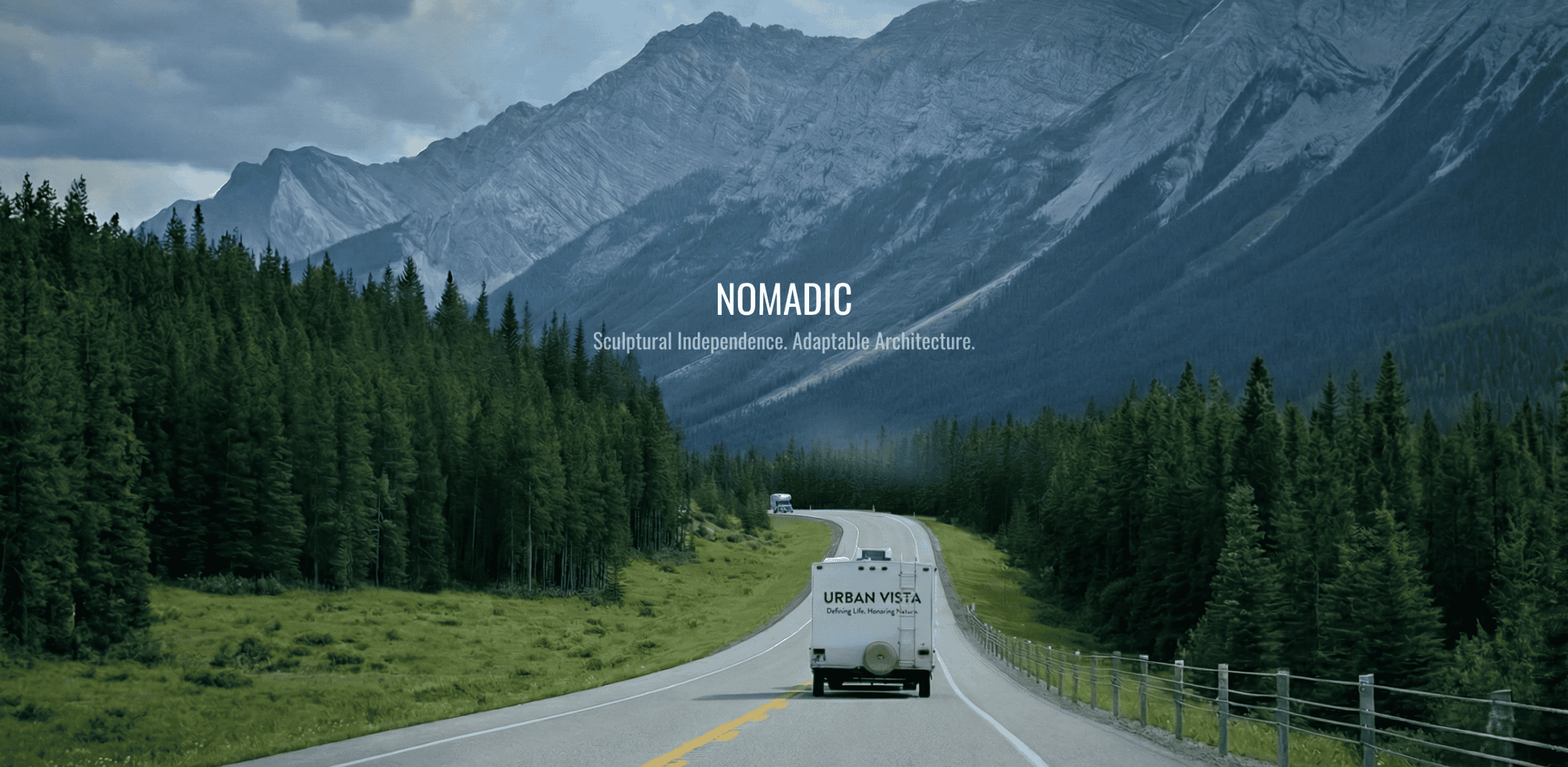 Urban Vista custom motorhome traveling through mountains. Adaptable mobile architecture engineered for Vancouver BC clients.