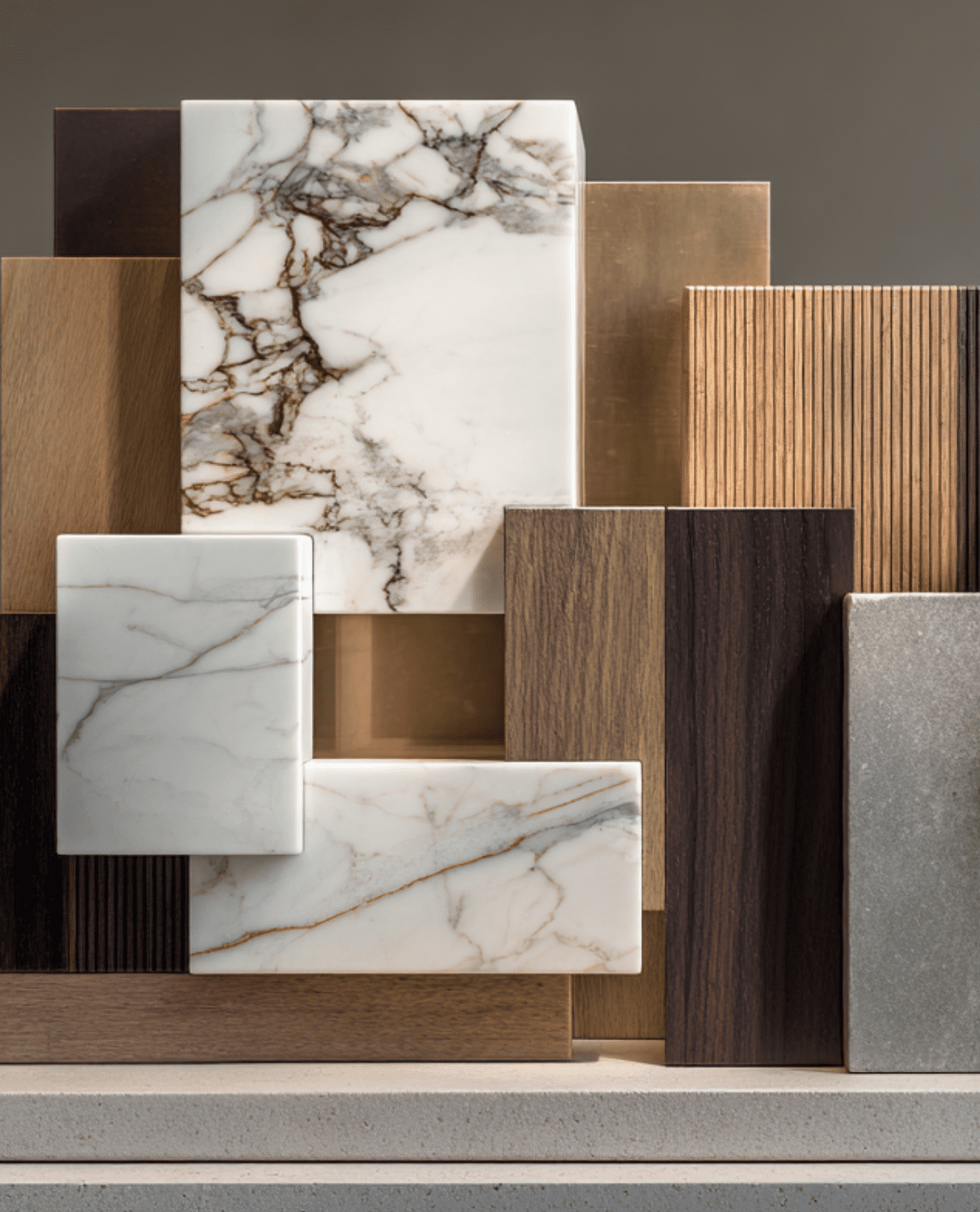 Curated collection of premium materials including marble, rare woods, and bespoke metal finishes. Designing high-end architectural interiors in Vancouver, BC.