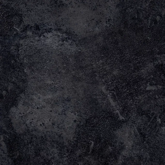 Charcoal basalt dark stone textured custom cabinet finish swatch. Tactile architectural millwork manufactured at our Port Coquitlam facility.