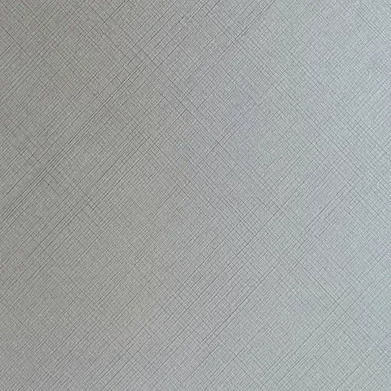Cross-hatched textured woven steel metallic facing. Tactile architectural cabinet doors supplied directly to B2B design professionals in the Lower Mainland.